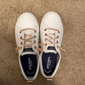 White Sperry slip on